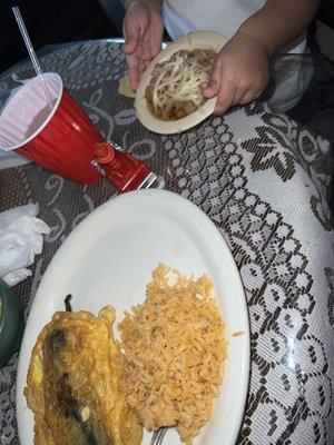 My daughter was quick to grab her beans Best chile relleno