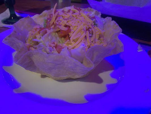 What is up With the light on the taco salad with barbacoa, Delicious