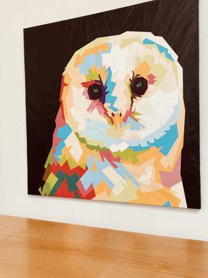 The artwork is varied, diverse and made the space seem happy.