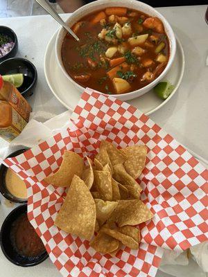 Seafood soup and chips
