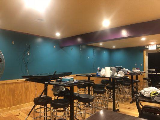 Before opening, while painting