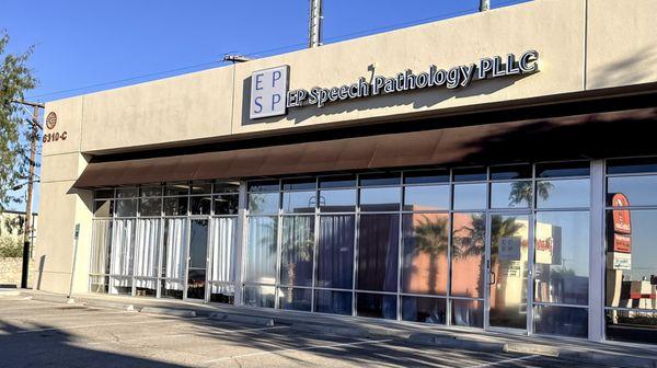 Exterior photo of the clinic with the main entrance at Door 1 and the newly expanded front area.