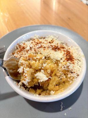 Inside of Elote-style corn pudding. Creamy, sweet, spicy