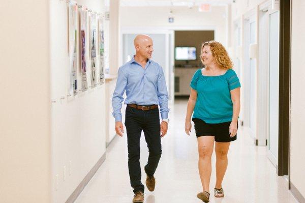 Dr. Miller walking with patient days after surgery!