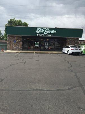 McGee's Stamp and Trophy