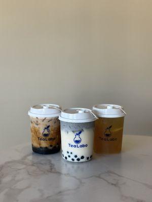 Dirty boba, jasmine milky tea with black sesame, honey kumquat lemon tea.