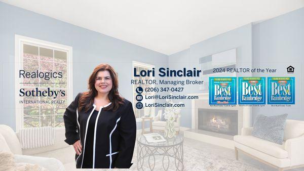 2023 Realtor Achievement Award winner Lori Sinclair standing in Bainbridge Island living room.