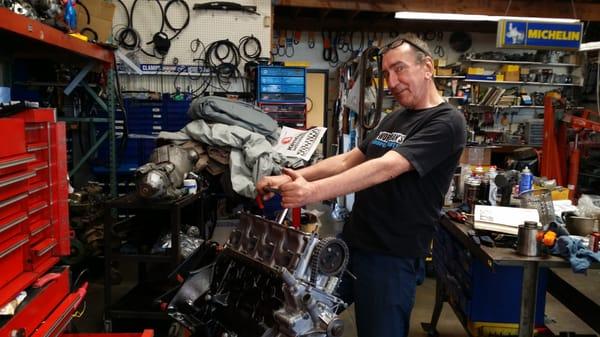 Mate rebuilding a BMW 2002 motor.