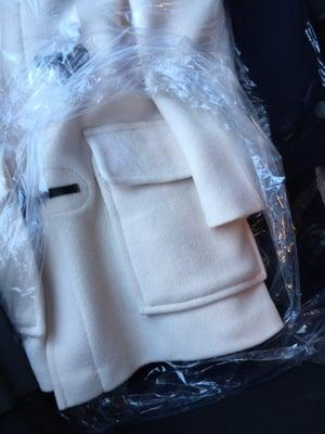 Stained area was very bad. Burberry duffle coat. Very nice now.