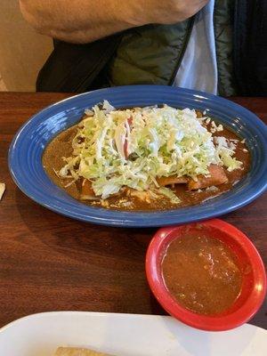 Two types of enchiladas ground beef and chicken. the sauce was great.