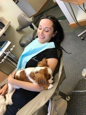 One of our patients with one of our therapy dogs. By appointment only!