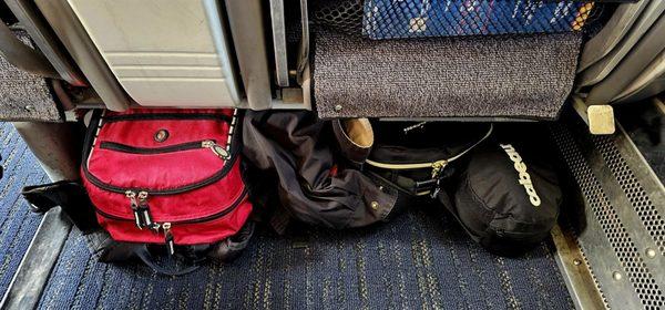 Underneath storage fits 2 backpacks