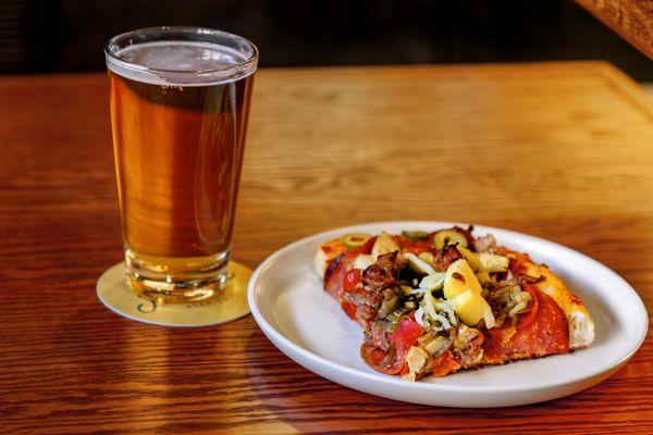 Beer and a Slice of Pizza