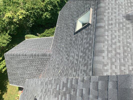 Shingle and skylight installation