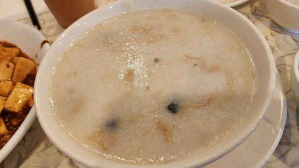 Porridge, pork and black egg