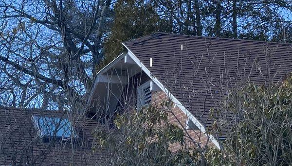 top front eve(?) w/shingles off. leaks