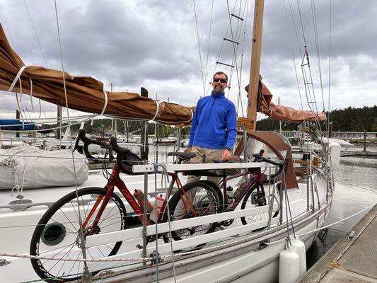 Captain Tracy securing our bikes to the side rail.