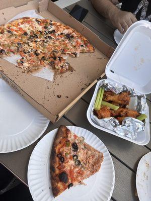 Veggie pizza and hot wings