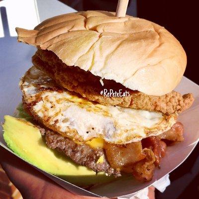 A Hangover Burger from the weekend. Beef, egg, cheddar, bacon, avocado, and chicken strip.