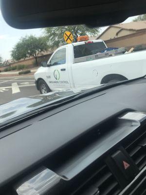 This car was throwing thrash at the street