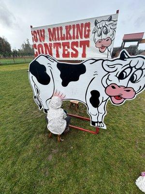 "Cow milking" station for the little ones.
