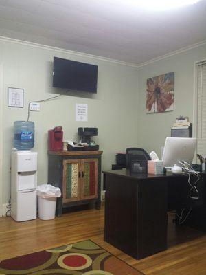 Receptionist area. Water, coffee and snacks - ONE PER PERSON, y'all. Literally, never seen anything but candy offered, other places.