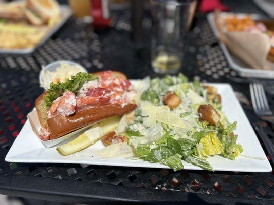Lobster roll with a Caesar salad. 5*