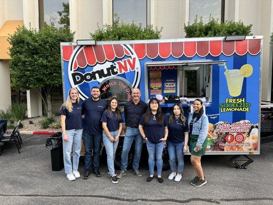 Celebrating community (and donuts!) with the folks who matter most--our clients.