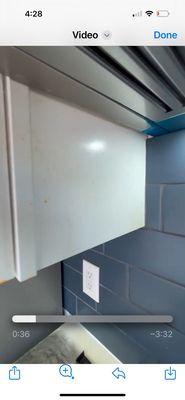 Cabinet above stove still have noticeable oily spot.