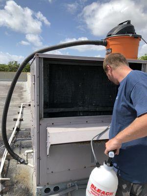 Rooftop package unit evaporator coil cleaning