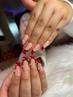 Long nails with red French and pearls