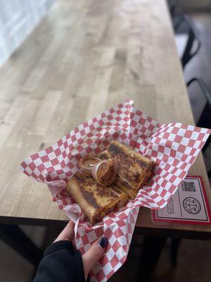 crispy bacon, egg, potato, and cheese house made burrito