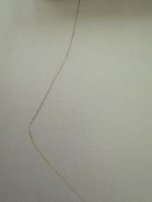 Crack that was told was dirt line because I wanted white and should use soft scrubbed to clean.