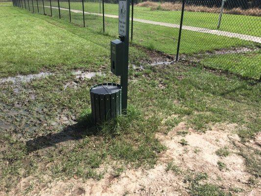 This is by the entrance, see just past the trash can, that river comes right under the fence