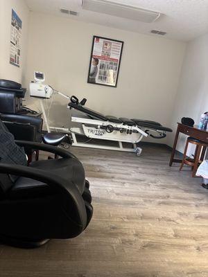 Massage chair area and adjuster.