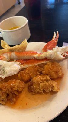Sweet and sour chicken and crab legs