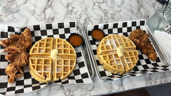 Plain waffles and chicken with there buffalo maple syrup.