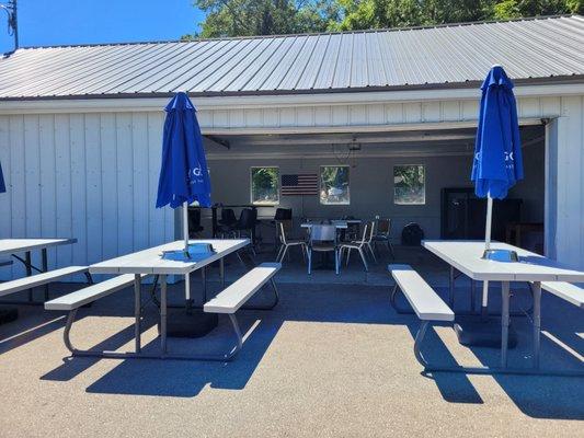 One of the outdoor seating area (smoking allowed) and a garage with additional seating.