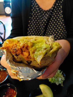 Vegan burrito with housemade seasoned soy protein, spanish rice and guacamole