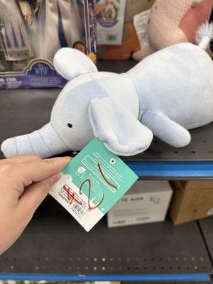 Small stuffed animal with sharpie it's on its ear