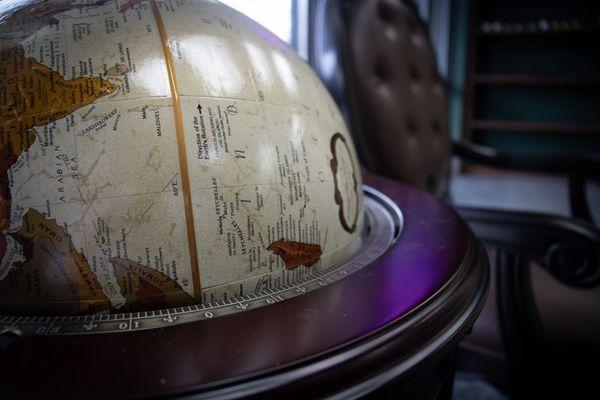 A vintage-style globe accent that adds to our gentleman's-club classic and refined aesthetic.