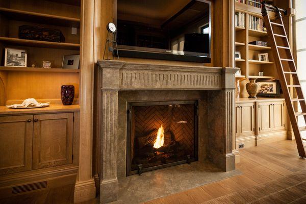 Carved Stone Fireplace - Lambert Stoneworks