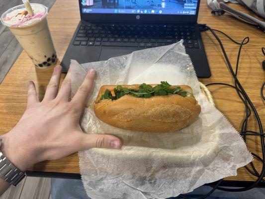 Banh mi and a peach smoothie wuth brown sugar boba