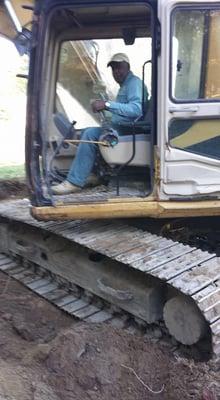 this is a picture of me doing some work with a excavator machine