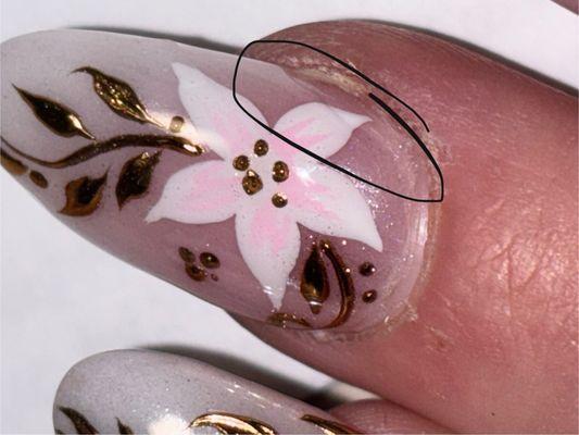 Gap shows where original clear coat DID MOT REACH THE TOP EDGE LF MY NAIL. My Ca Nail lady put another coat on top