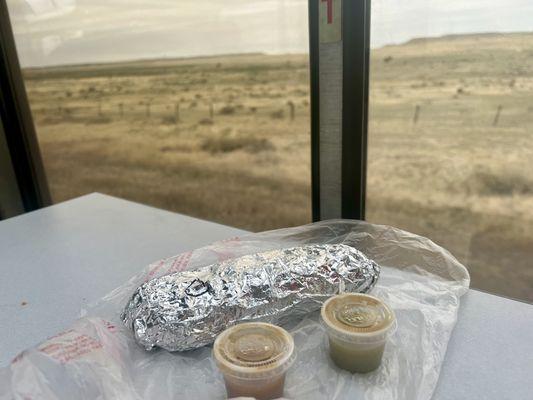 Potato, beef, green chili burrito with Christmas salsa. Satisfying and delicious.
