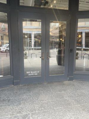 Entrance directly outside AMP coffee.