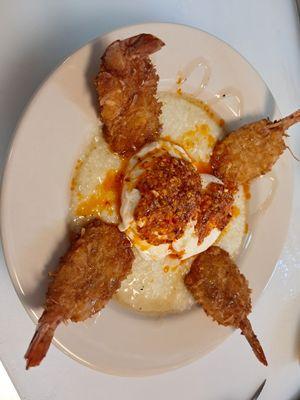 Breakfast Coconut Shrimp and Grits with poached eggs