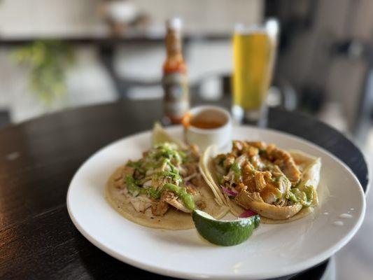 Chicken tacos with house made sauce and a Free to B West Coast beer in the background.