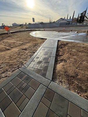 Paver walkway to horseshoe driveway